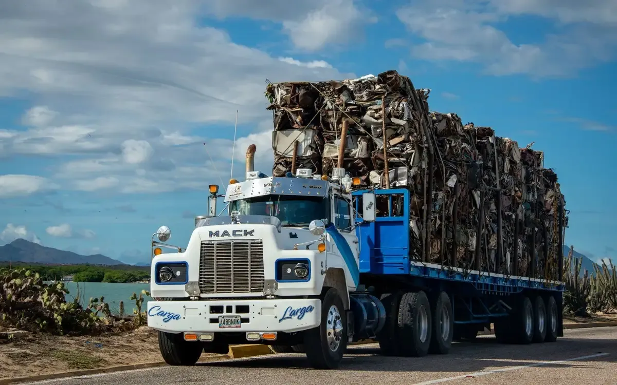 Scrap Metal Pickup Service Brisbane Scrap metal pickup truck collecting sorted metal from a Brisbane property